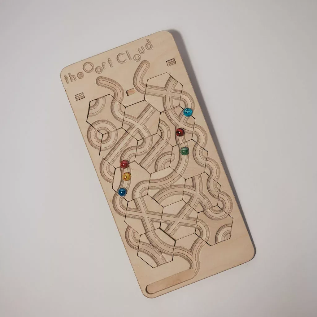 The Oort Cloud: A Marble Run Puzzle Game